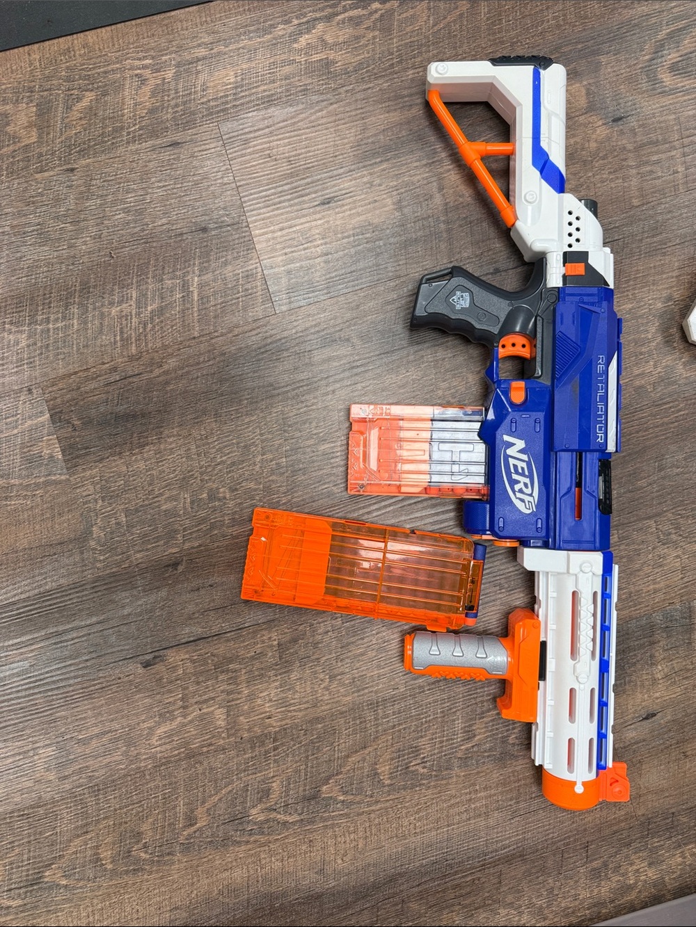 Nerf Blue White and Orange Rival Blaster with Translucent Orange Mags